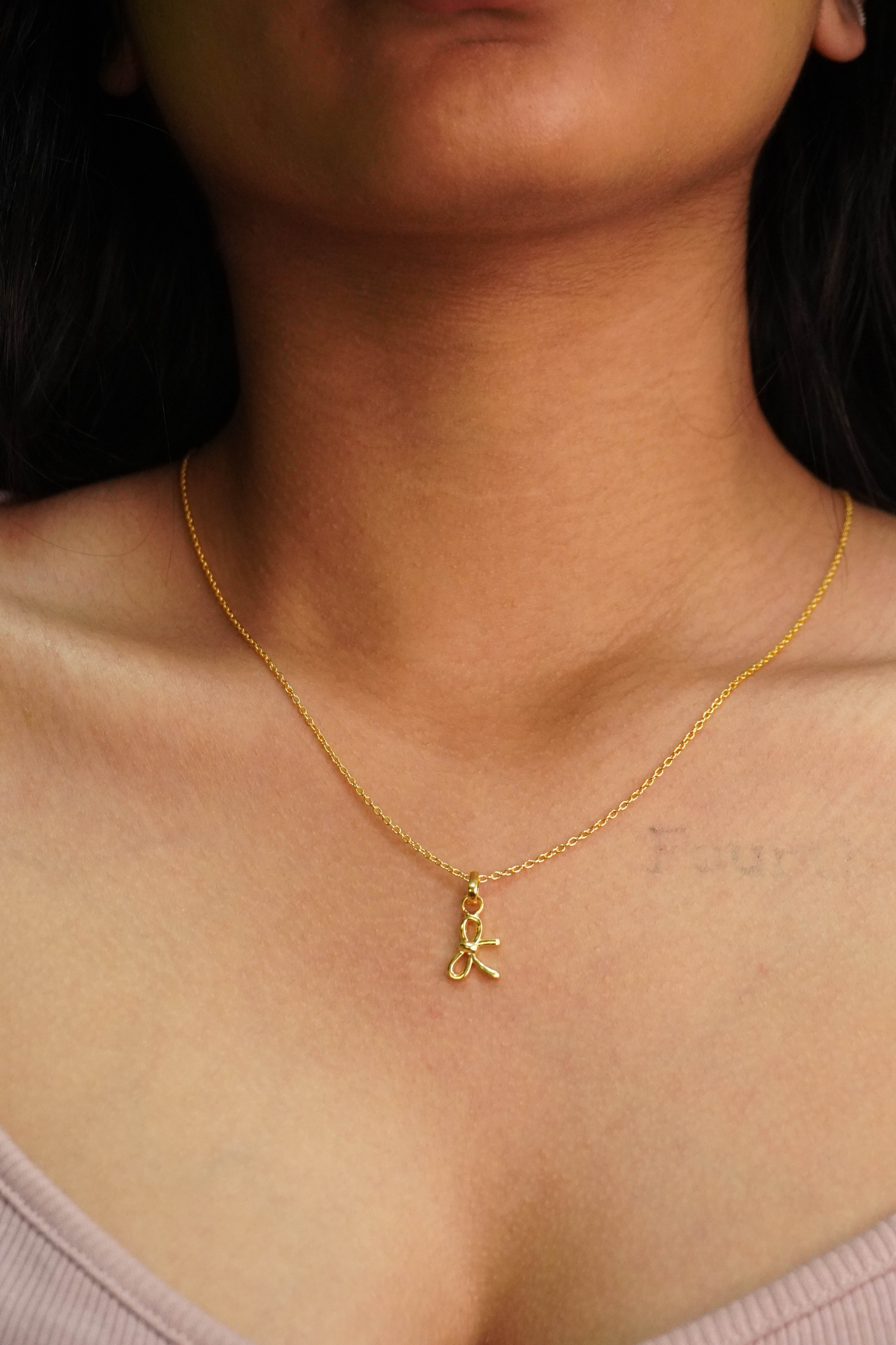 Bow Whisper Pendant
(Without Chain)