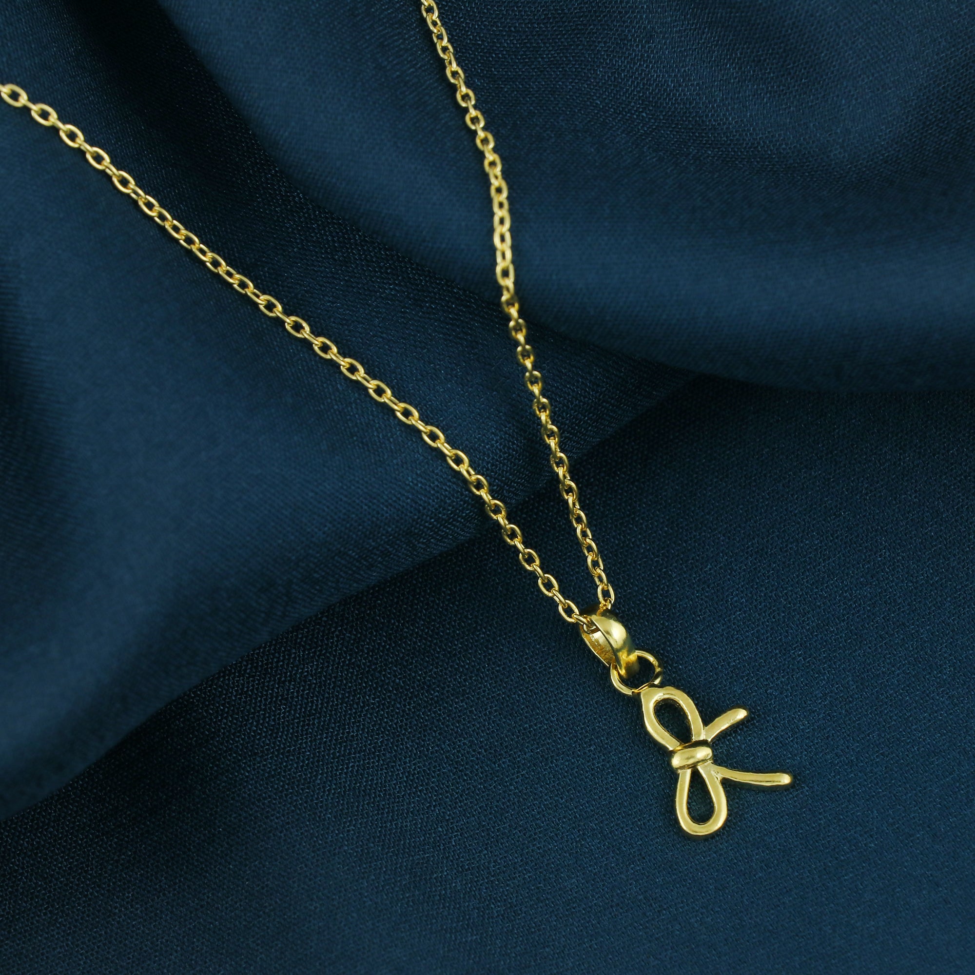 Bow Whisper Pendant
(Without Chain)